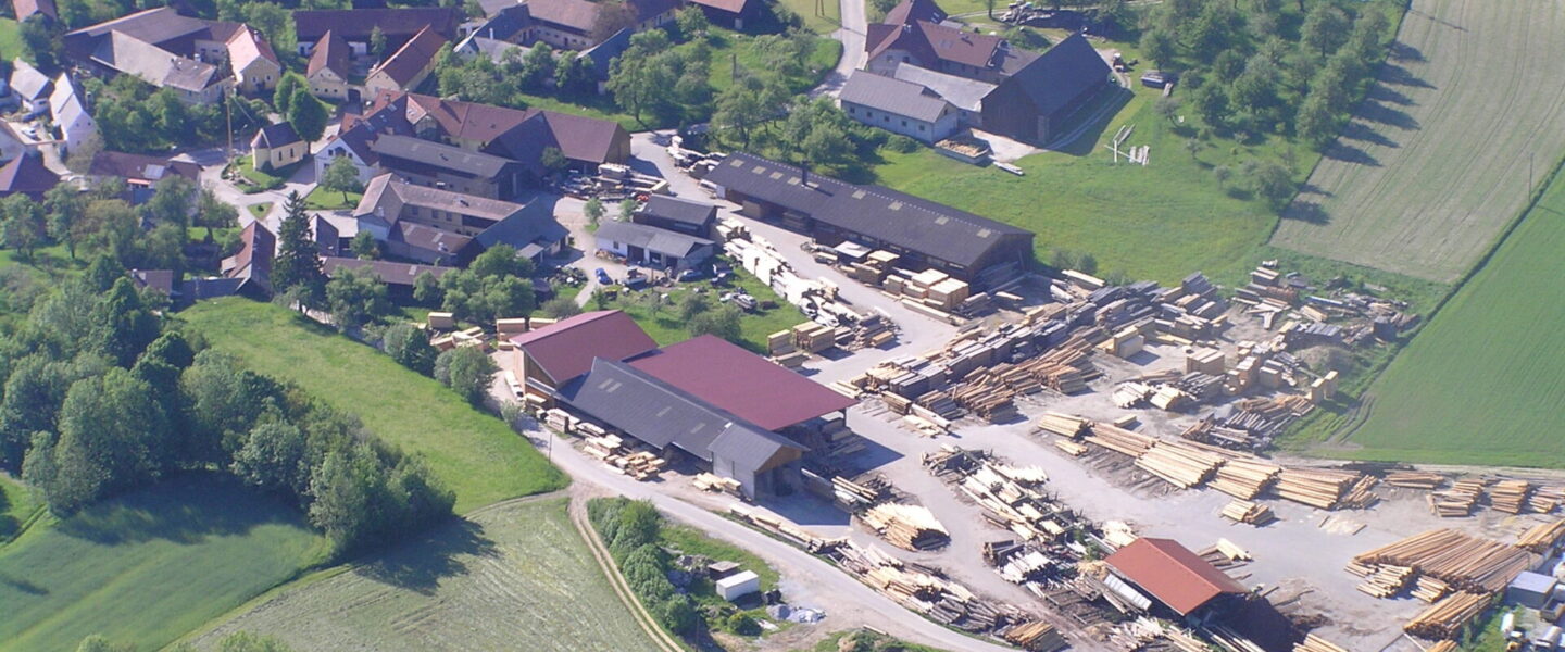Shows an aerial view of the Hoellmueller Holz site